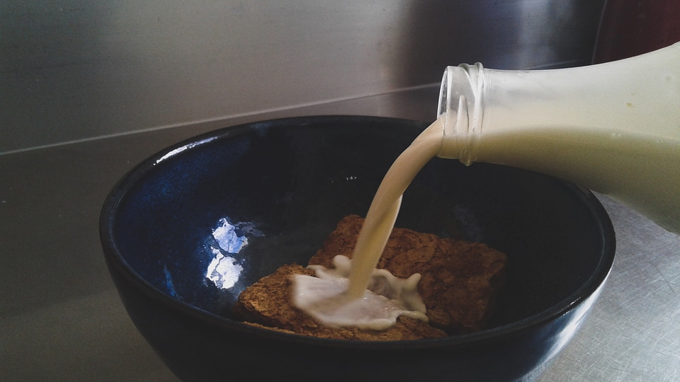 Milk Being poured on Cookies photo
