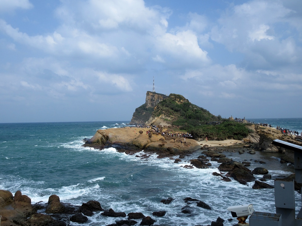 Water and shoreline with tourists
