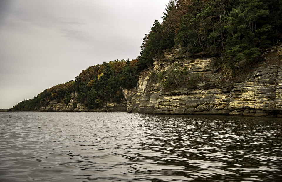 Rocky Shoreline with trees and Autumn Leaves