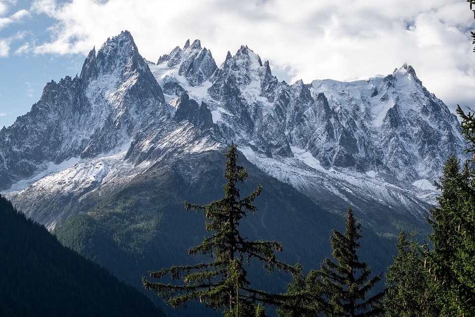 Mountain peaks, clouds, and landscape