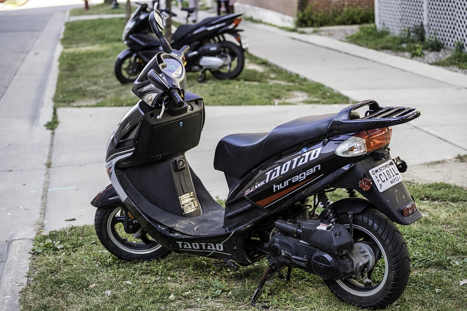 Motorcycle parked on the sidewalk