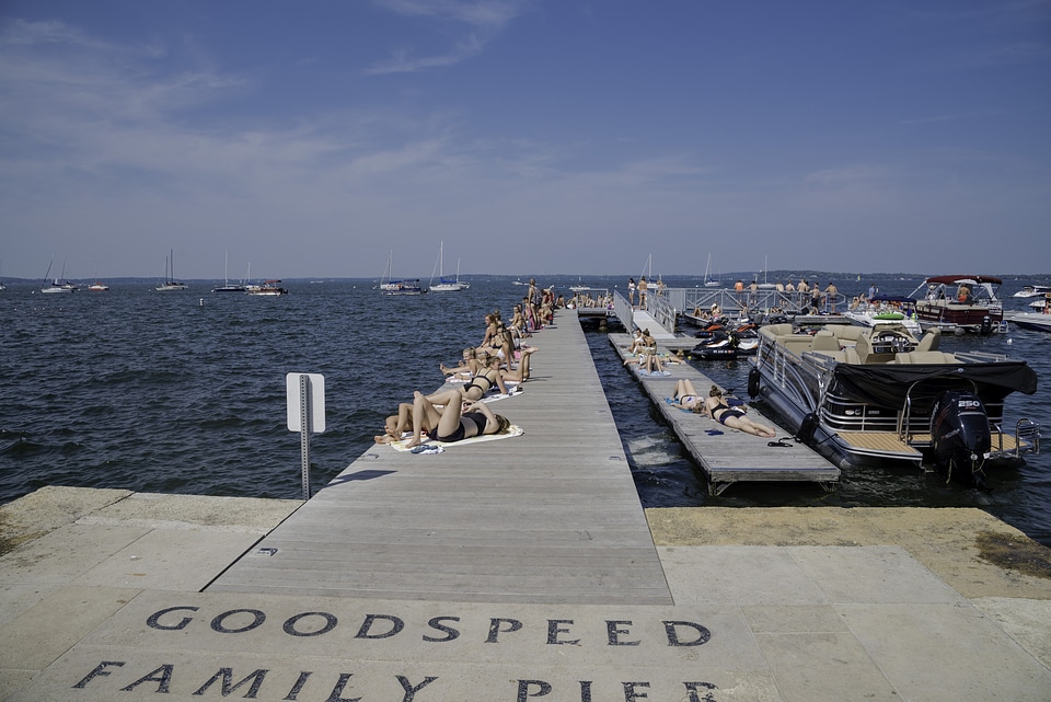 Girls sunbathing on the Pier at Lake Mendota, Madison