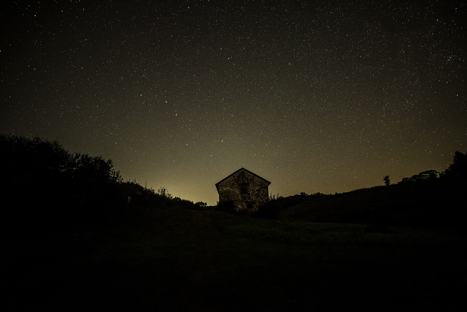 Stars over an old house photo