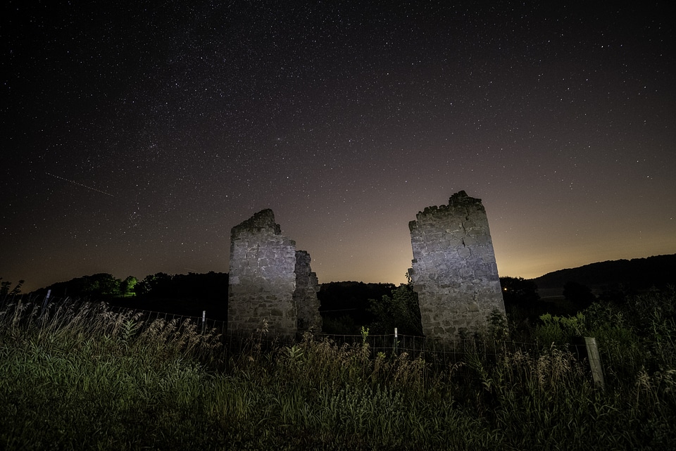 Stars over the Ruined posts of a house photo