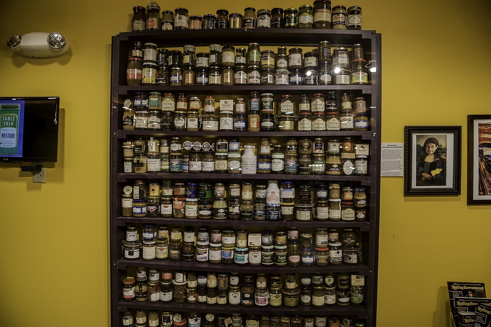 Shelf of precious Mustard at the National Mustard Museum