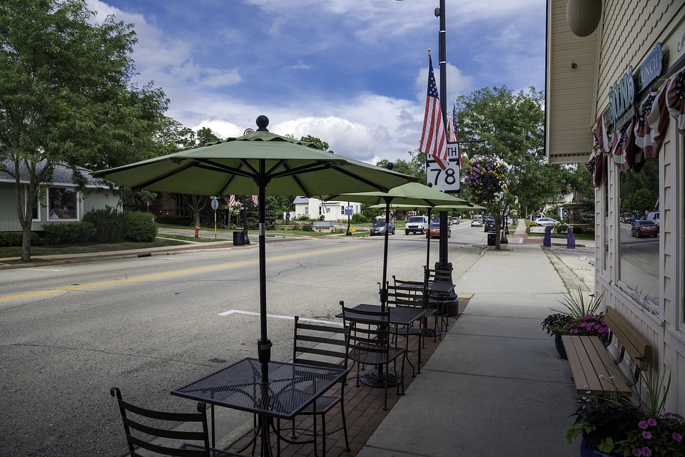 Outside dining place on the sidewalk with sky in Mount Horeb