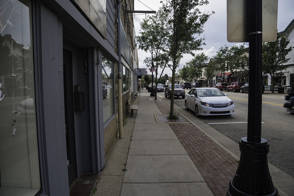 Sidewalk View with trees and stores in Mount Horeb, Wisconsin