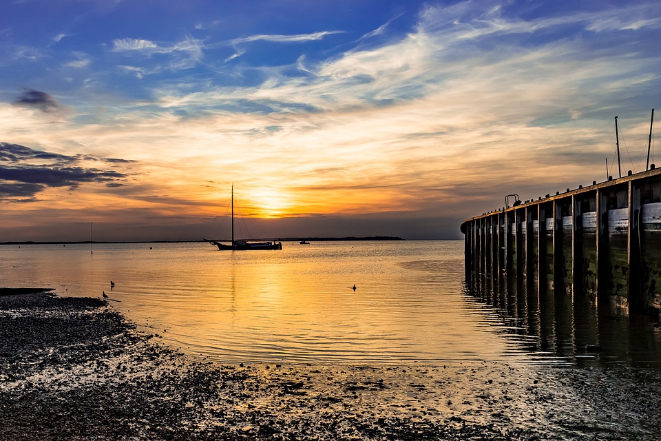 Landscape of sunset near the shore with boat