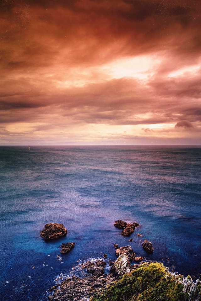 Dusk and red skies over the ocean