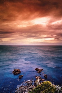 Dusk and red skies over the ocean