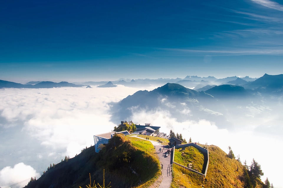 Overlook at the clouds in the Swiss Alps photo