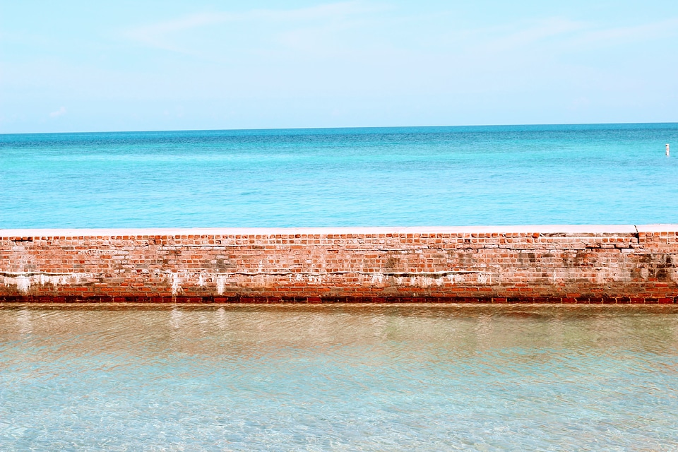 Moat wall against the ocean and the horizon