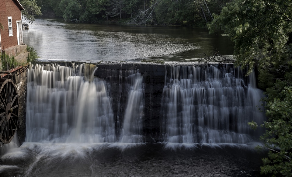 Mills Waterfall with the Mill house