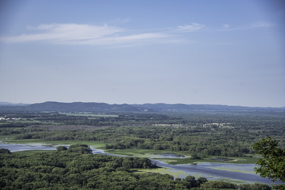 River flowing through the valley landscape at Great River Bluffs State Park