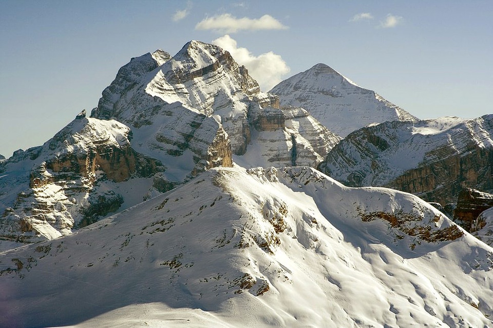 Tofana Group and snow capped mountains in the Dolomites, Italy