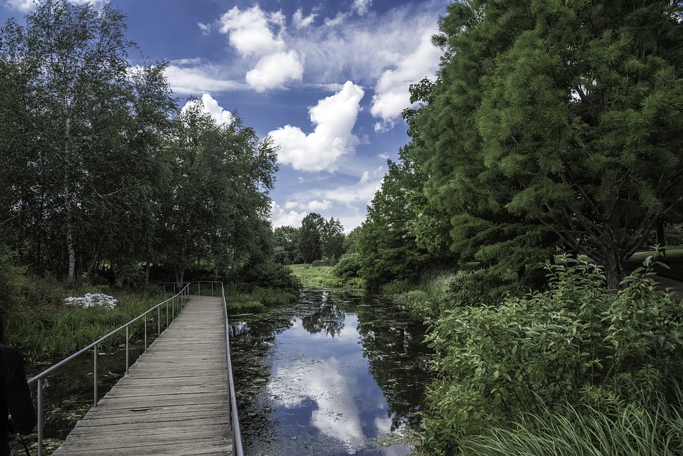 Walkway across the pond under the skies at Chicago Botanical Gardens