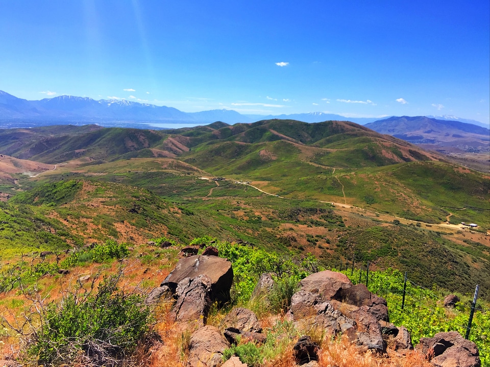 Hills landscape with large rocks in the foreground photo