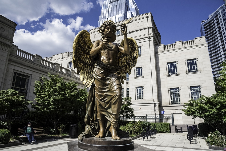 Statue in front of buildings in downtown Nashville