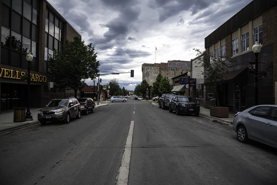Buildings, cars, buildings, and sky on a stormy day in Helena