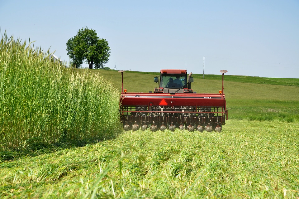 Harvesting Crops with tractor in Iowa