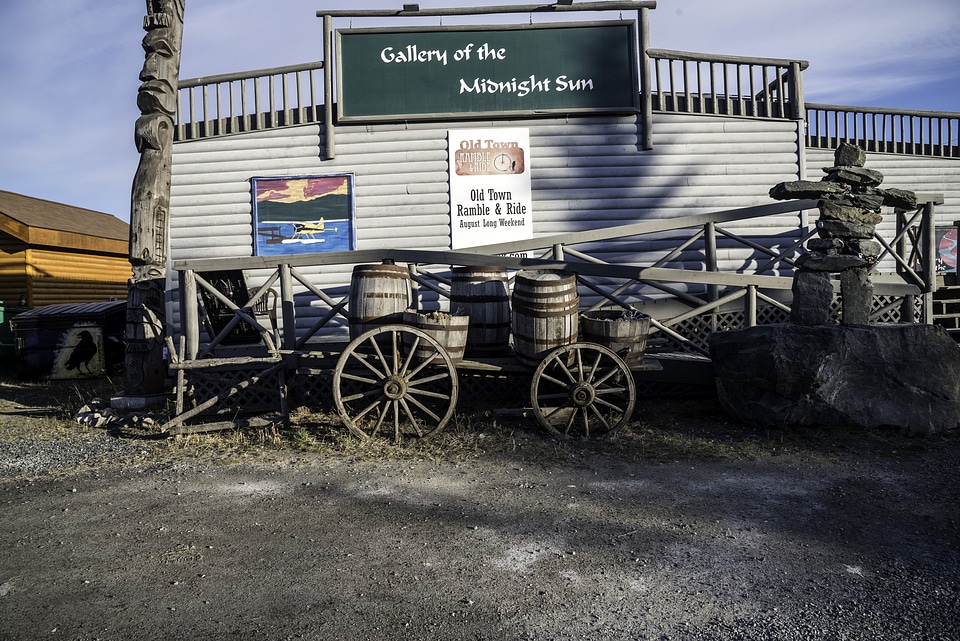 Gallery of the Midnight sun with Wheelbarrow in front in Yellowknife