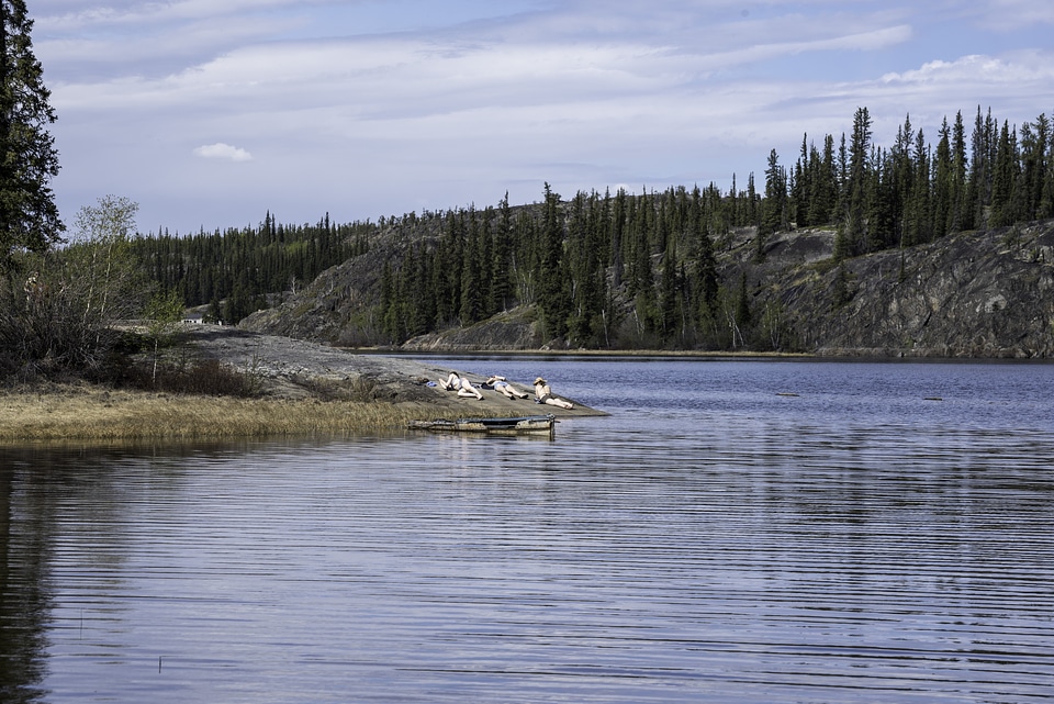People Sunbathing on the Shore on Prelude Lake, Ingraham Trail