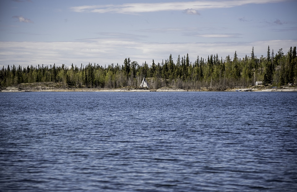 Tent on the other side of the lake on the Ingraham Trail