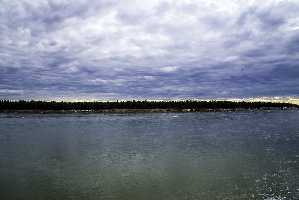 Landscape across the McKenzie River under the Clouds