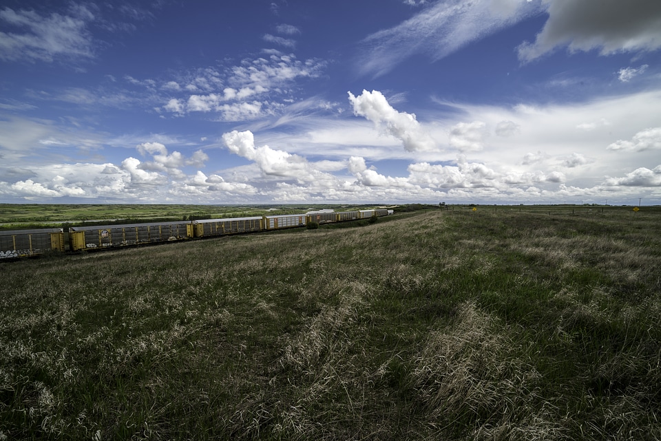 Train and landscape under the Beautiful Skies in Saskachewan