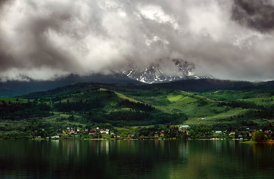 Clouds over the lake and mountains in Colorado photo