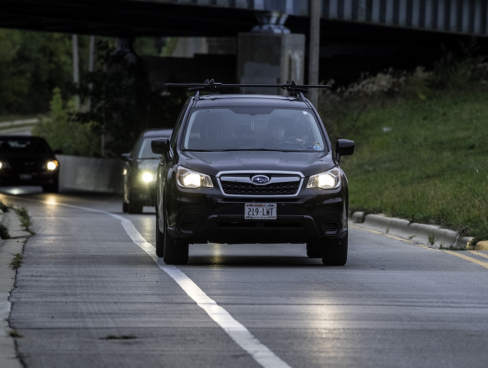 Car and traffic on the road coming towards me