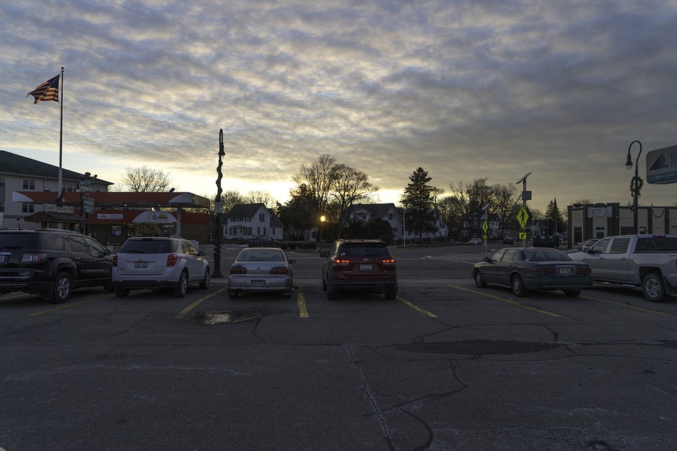 Parking Lot sunset under cloudy skies
