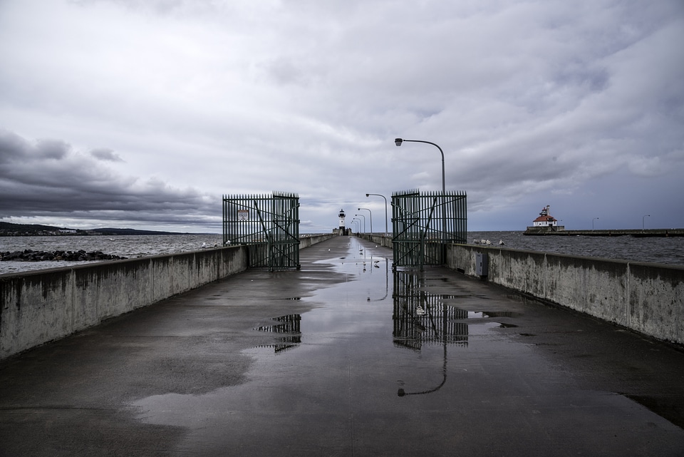 Walk to the Light House in Duluth, Minnesota under cloudy skies