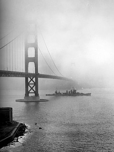 Ship under Golden Gate Bridge in San Francisco, California photo