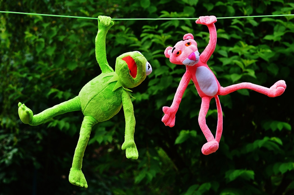 Plush toys of Kermit and Pink Panther