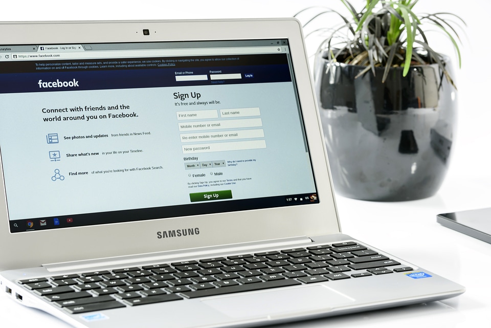 Facebook on the screen of a laptop