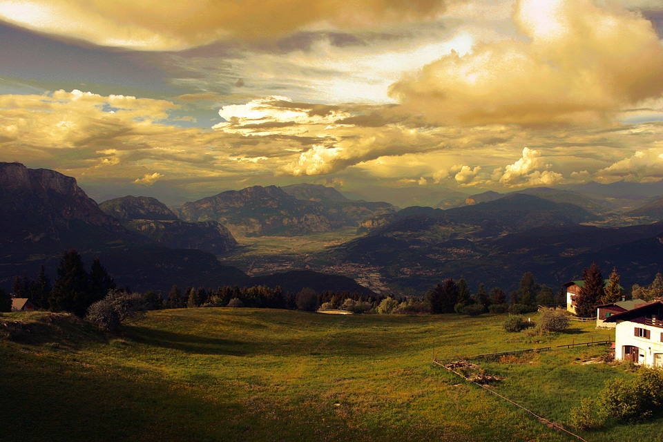 Golden landscape with clouds and hills