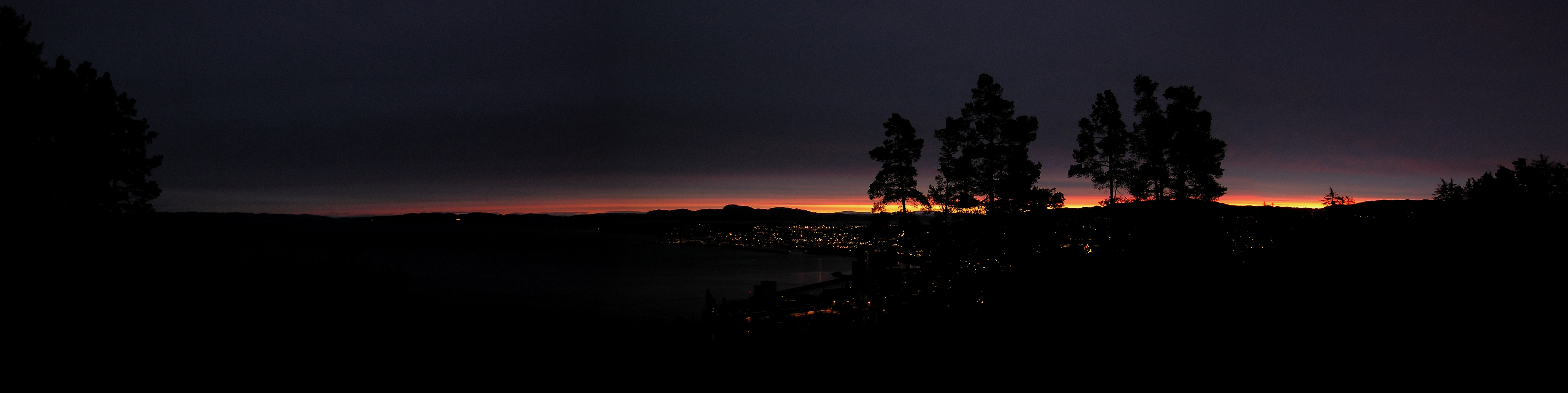 Far Night Time Panoramic View of Trondheim from across the water