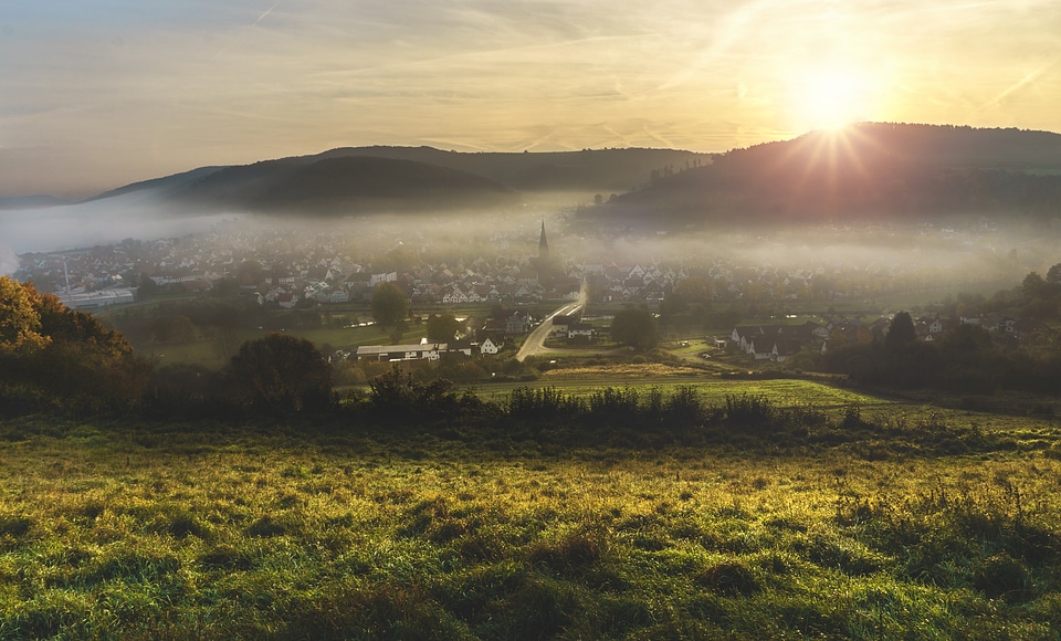 Sunlight over the landscape of Lugde, Germany photo