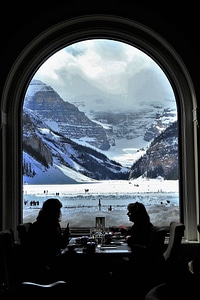 Beautiful Mountain through a window from a dining place in Banff National Park, Alberta, Canada photo