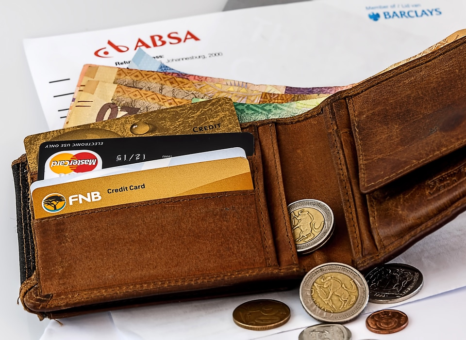 Open Wallet with coins and credit cards