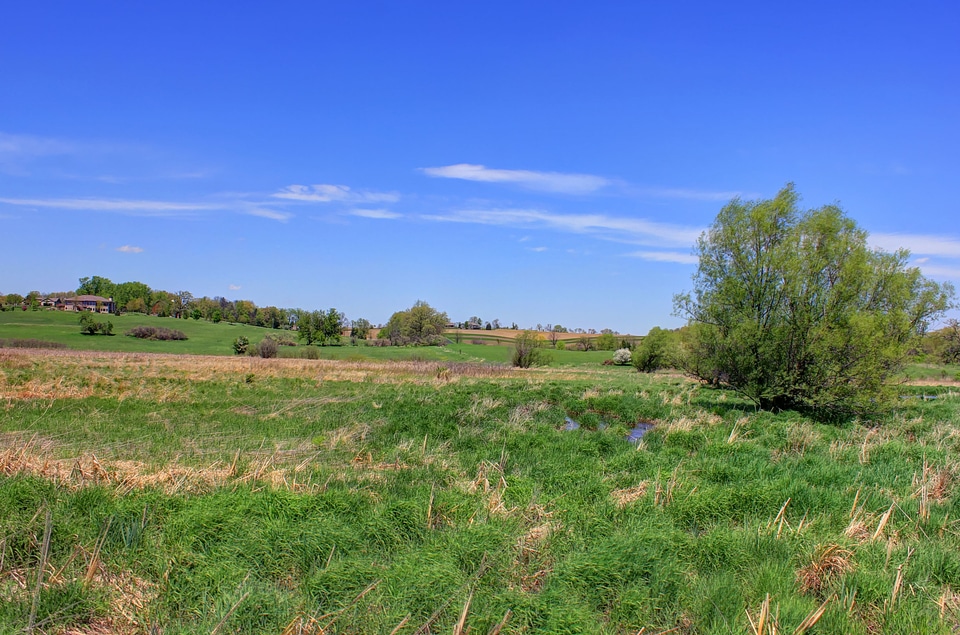 Landscape of sky and grassland on the Military Ridge State Trail