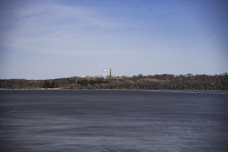 Trees and watertower on the opposite shore