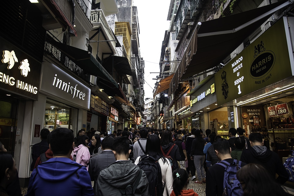 People moving up the street in Macau