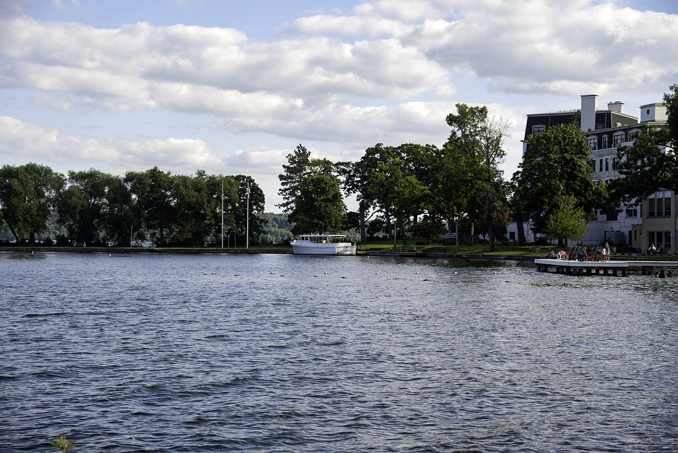 Boat on Green lake with clouds