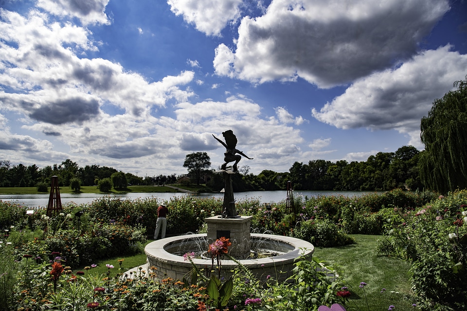 Clouds over the central statue in the garden