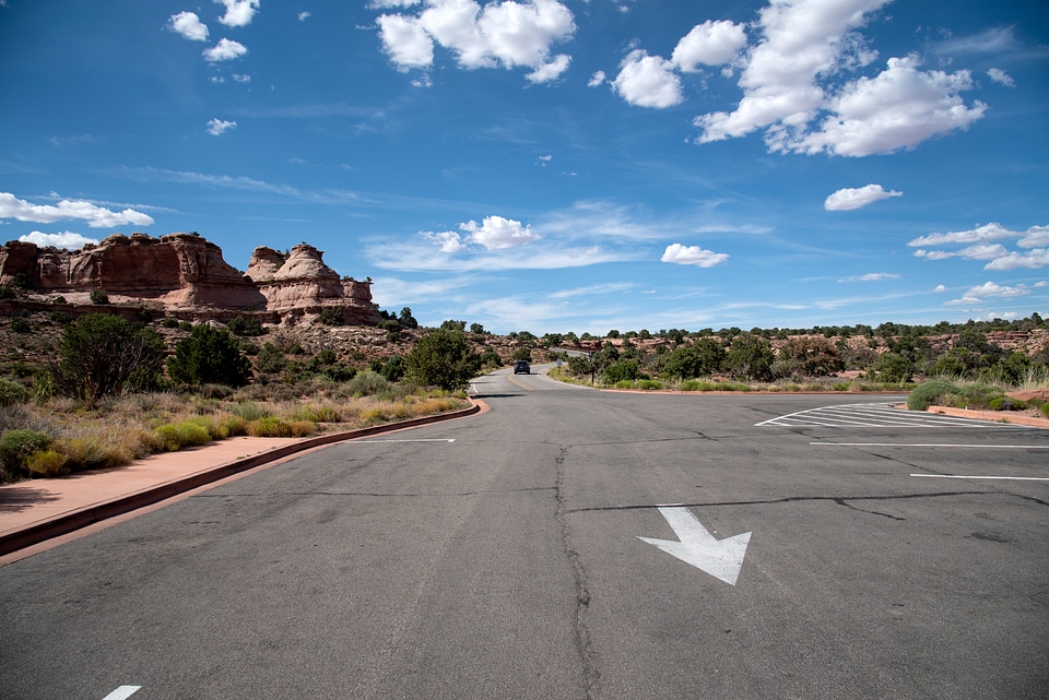 Road through Canyonlands National Park under the blue sky