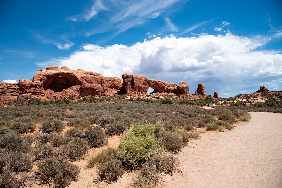 Clouds appearing over twin arches