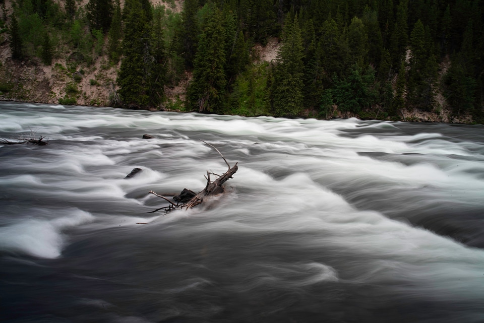 Whitewater flowing over rocks photo