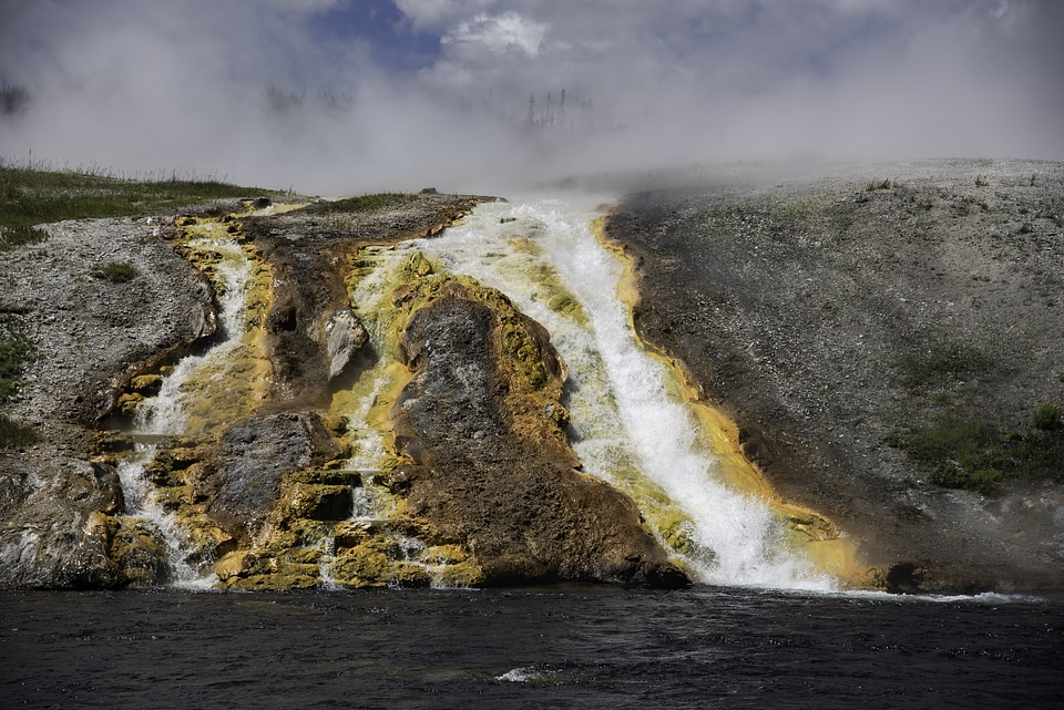 Steaming hot water flowing down from the springs